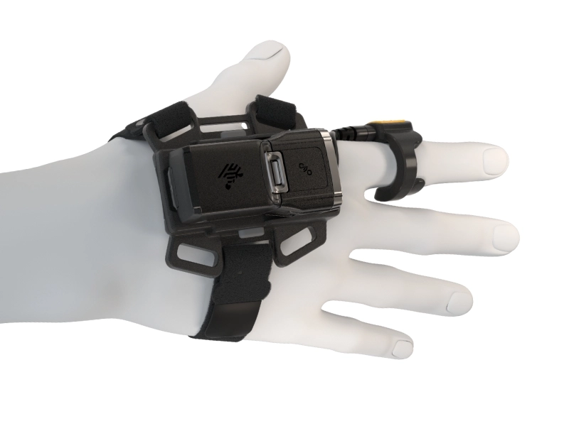 Zebra RS6100 wearable 1D/2D Bluetooth ring scanner on a hand, with ambidextrous trigger for rugged warehouse logistics and barcode scanning
